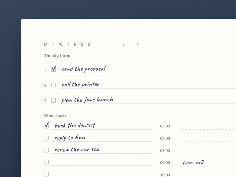 The daily planner open on a day filled in by hand, with send the proposal, call the printer and plan the June launch under The big three