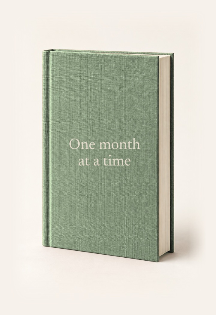 The cover of One month at a time, a hardcover in Sage with its title on the front.