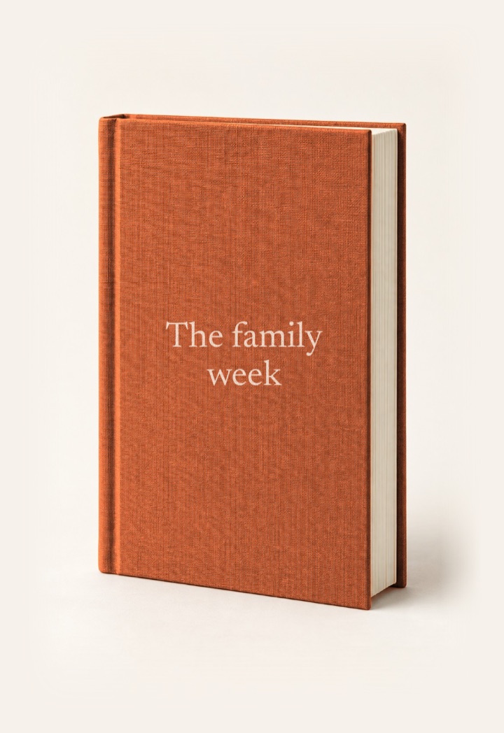 The cover of The family week, a hardcover in Burnt orange with its title on the front.